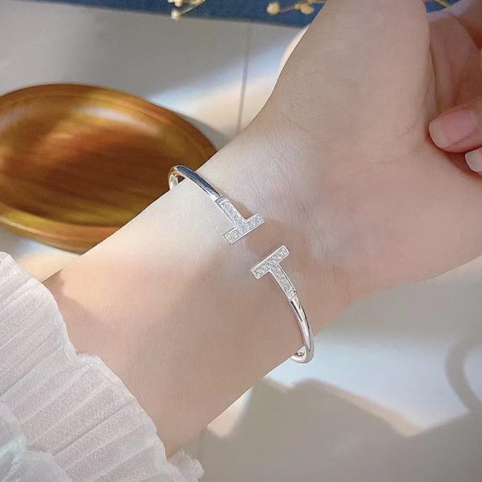 T white bracelet- bangle 18 K with diamond Diamond jewelry