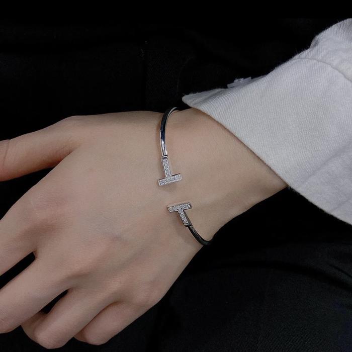 T white bracelet- bangle 18 K with diamond Diamond jewelry