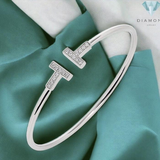 T white bracelet- bangle 18 K with diamond Diamond jewelry